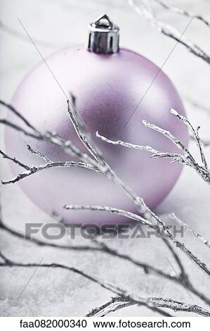 Christmas bauble and silver branches View Large Photo Image Stock Image - Christmas bauble and silver branches. Fotosearch