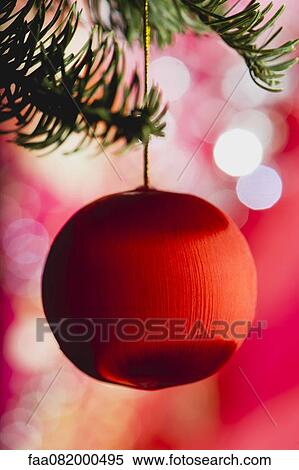 Christmas bauble hanging on branch View Large Photo Image Stock Photography - Christmas bauble hanging on branch. Fotosearch