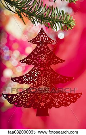 Christmas tree ornament hanging on branch View Large Photo Image Stock Photography - Christmas tree ornament hanging on branch. Fotosearch