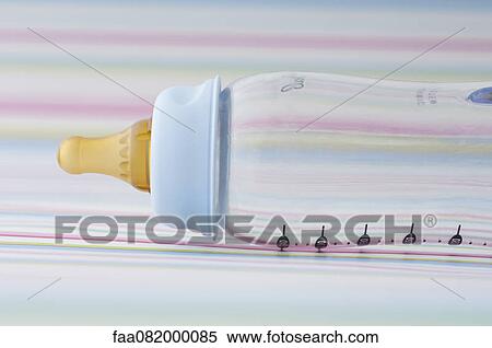 Empty baby bottle on striped background View Large Photo Image Stock Photography - Empty baby bottle on striped background. Fotosearch