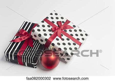 Stock Image - Festively wrapped Christmas gifts. Fotosearch