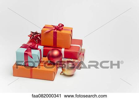 Stock Image - Festively wrapped Christmas gifts. Fotosearch