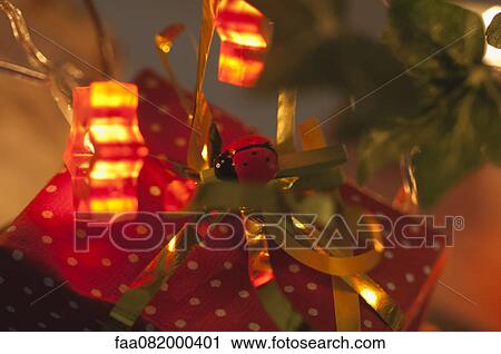 Stock Image - Festively wrapped Christmas present. Fotosearch