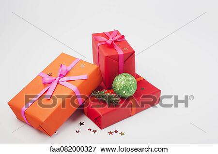 Festively wrapped Christmas presents View Large Photo Image Stock Photo - Festively wrapped Christmas presents. Fotosearch