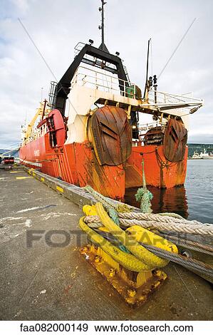 Fishing boat docked in harbor View Large Photo Image Stock Photo - Fishing boat docked in harbor. Fotosearch