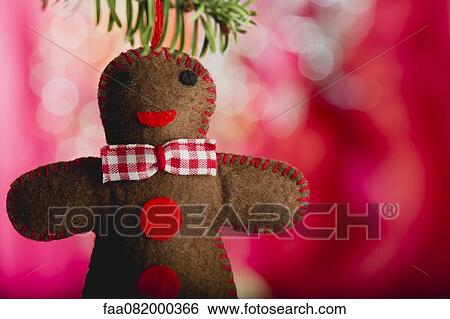 Stock Photograph - Gingerbread man Christmas ornament. Fotosearch
