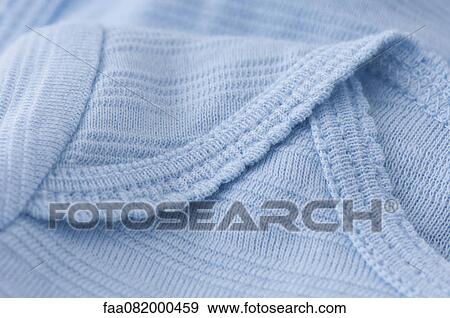 Knitted baby clothing, close-up View Large Photo Image Stock Photo - Knitted baby clothing, close-up. Fotosearch