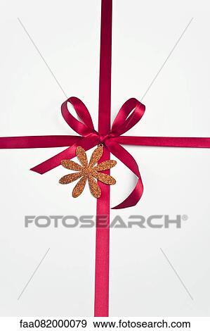 Red ribbon and bow on white background View Large Photo Image Stock Photo - Red ribbon and bow on white background. Fotosearch