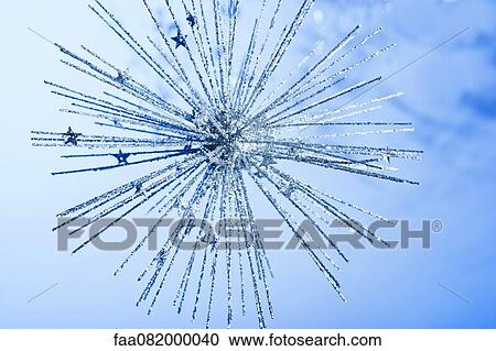 Stock Image - Silver glittered ornament. Fotosearch