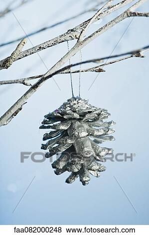 Stock Photo - Silver pine cone ornament. Fotosearch