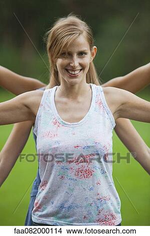Young woman exercising View Large Photo Image Picture - Young woman exercising. Fotosearch