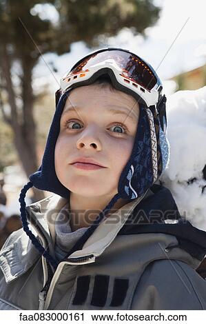 Boy wearing ski goggles, portrait View Large Photo Image Stock Image - Boy wearing ski goggles, portrait. Fotosearch