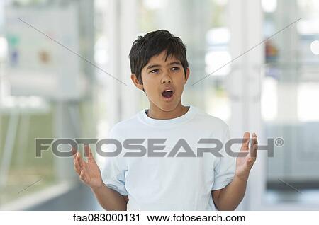 Boy with shocked expression on face View Large Photo Image Stock Image - Boy with shocked expression on face. Fotosearch