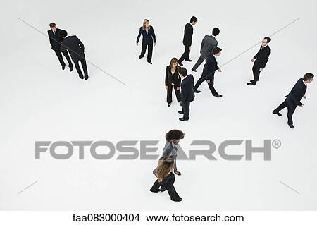 Picture - Business professionals on the move. Fotosearch