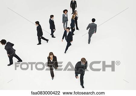 Business professionals on the move View Large Photo Image Stock Image - Business professionals on the move. Fotosearch