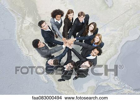 Camaraderie between business associates encourages greater cooperation View Large Photo Image Picture - Camaraderie between business associates encourages greater cooperation. Fotosearch