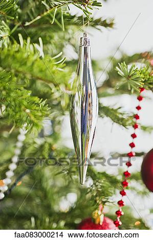 Christmas ornament on tree View Large Photo Image Picture - Christmas ornament on tree. Fotosearch