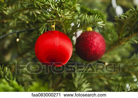 Christmas ornaments on tree View Large Photo Image Stock Image - Christmas ornaments on tree. Fotosearch