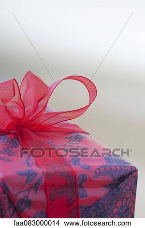 Christmas present, close-up View Large Photo Image Picture - Christmas present, close-up. Fotosearch