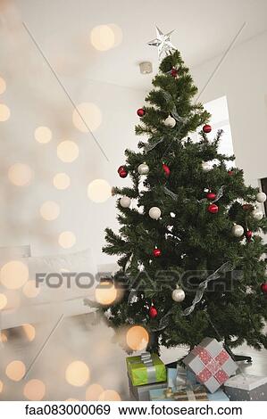 Christmas tree and Christmas presents View Large Photo Image Stock Photo - Christmas tree and Christmas presents. Fotosearch