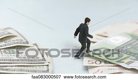 Dollar and euro compete to be world standard currency View Large Photo Image Stock Photo - Dollar and euro compete to be world standard currency. Fotosearch