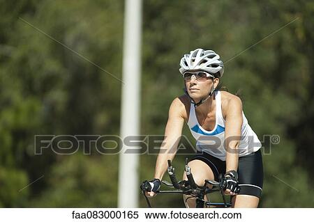 Famel cyclist View Large Photo Image Stock Photography - Famel cyclist. Fotosearch
