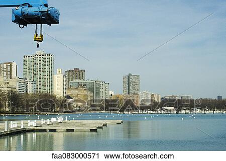 Stock Image - Loading crane, marina Lake View, Chicago. Fotosearch