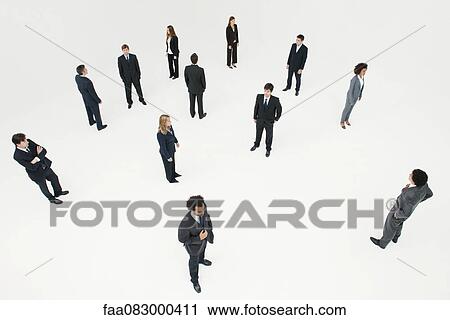 Stock Image - Men and women dressed in business attire. Fotosearch