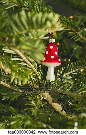Mushroom shaped Christmas ornament on tree View Large Photo Image Stock Image - Mushroom shaped Christmas ornament on tree. Fotosearch