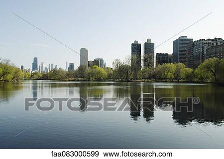 Pond in a park American, Chicago View Large Photo Image Stock Photo - Pond in a park American, Chicago. Fotosearch