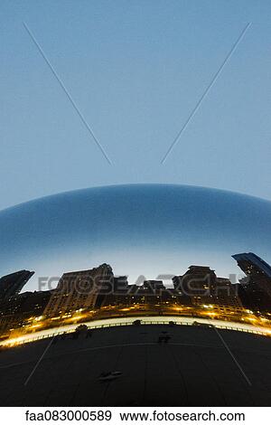 Stock Photo - Reflections on the American building cloud gate. Fotosearch