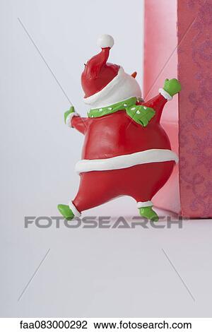 Santa Claus figurine, rear view View Large Photo Image Stock Image - Santa Claus figurine, rear view. Fotosearch
