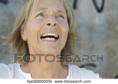 Senior woman with anguished expression on face View Large Photo Image Stock Photography - Senior woman with anguished expression on face. Fotosearch