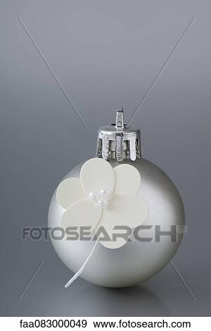 Silver Christmas ornament decorated with flowers View Large Photo Image Stock Photo - Silver Christmas ornament decorated with flowers. Fotosearch