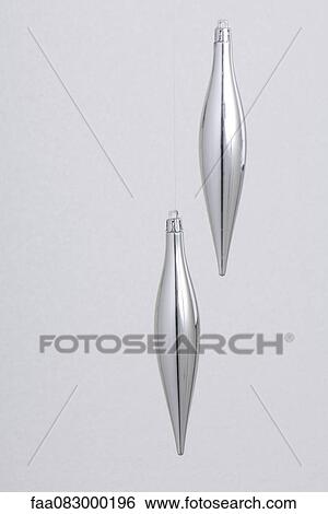 Stock Photograph - Silver Christmas ornaments. Fotosearch