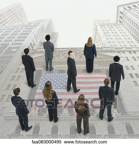 Successful businessman distinguishes himself from associates View Large Photo Image Stock Photography - Successful businessman distinguishes himself from associates. Fotosearch