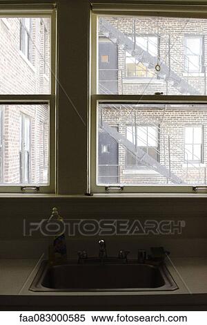 To a window on a fire escape U. S. View Large Photo Image Stock Photography - To a window on a fire escape U. S.. Fotosearch