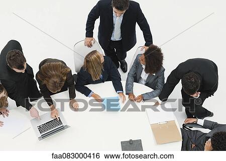 Stock Photograph - Working meeting. Fotosearch