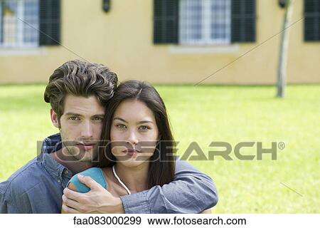 Stock Photo - Young couple, portrait. Fotosearch