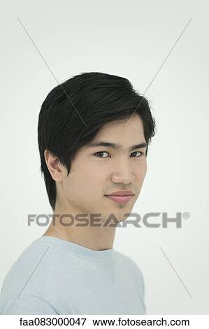Stock Photo - Young man, portrait. Fotosearch