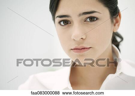 Stock Photo - Young woman, portrait. Fotosearch