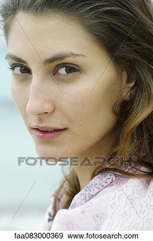 Stock Photo - Young woman, portrait. Fotosearch