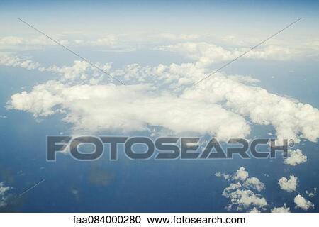 Aerial view aboard a passenger aircraft View Large Photo Image Stock Image - Aerial view aboard a passenger aircraft. Fotosearch