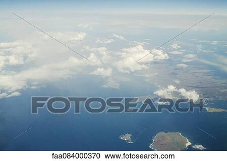 Aerial view aboard a passenger aircraft View Large Photo Image Stock Image - Aerial view aboard a passenger aircraft. Fotosearch