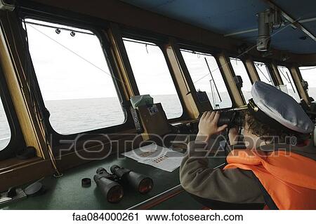 Boy playing captain, cockpit View Large Photo Image Stock Image - Boy playing captain, cockpit. Fotosearch