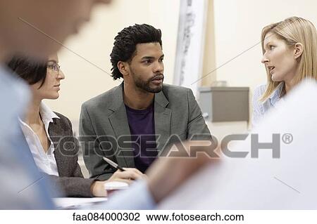Business people in meeting View Large Photo Image Stock Image - Business people in meeting. Fotosearch