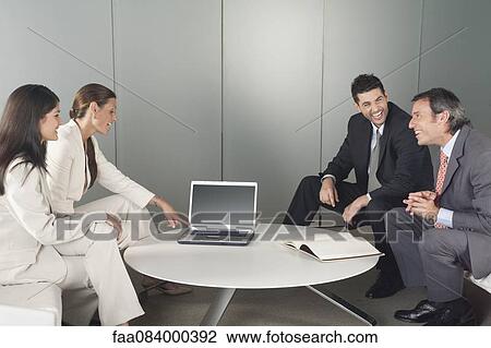 Business people in meeting View Large Photo Image Stock Image - Business people in meeting. Fotosearch