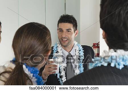 Businessman at office party View Large Photo Image Stock Image - Businessman at office party. Fotosearch
