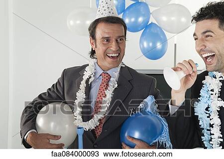 Businessmen having fun in office party View Large Photo Image Stock Image - Businessmen having fun in office party. Fotosearch