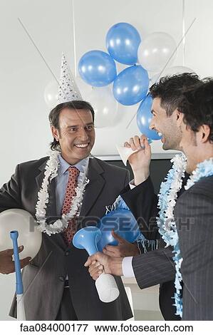 Businessmen in office party View Large Photo Image Stock Photo - Businessmen in office party. Fotosearch